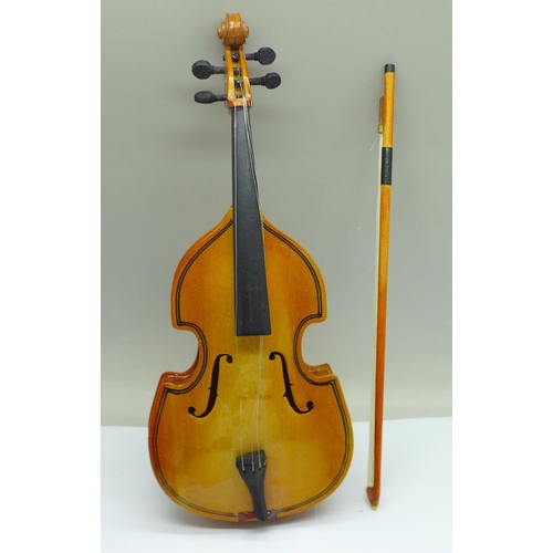 662 - A miniature cello, cased, 23.5cm