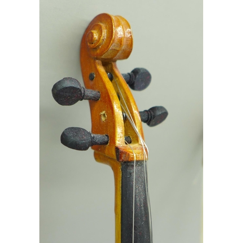 662 - A miniature cello, cased, 23.5cm