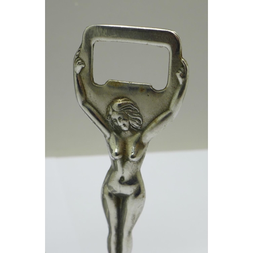 668 - An Art Deco figure, 25.5cm and a bottle opener