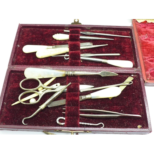 676 - A cased manicure set, two manicure boxes and tools