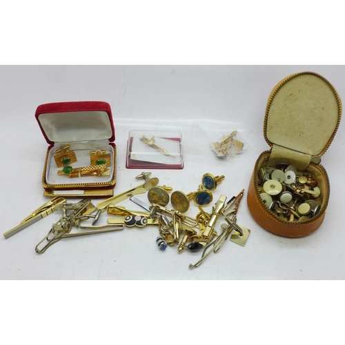 713 - A collection of cufflinks and tie pins