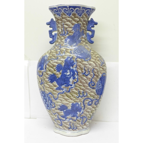 719 - A Chinese vase decorated with scales and dogs of foe, six character mark to the base, 37.5cm