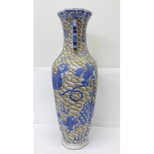 719 - A Chinese vase decorated with scales and dogs of foe, six character mark to the base, 37.5cm