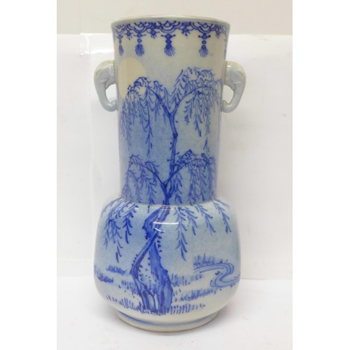 720 - A 19th Century Chinese blue and white vase with six character mark to the base, 21cm