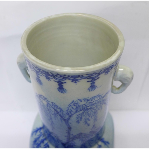 720 - A 19th Century Chinese blue and white vase with six character mark to the base, 21cm