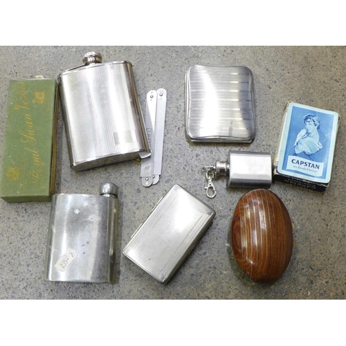 751 - Three hip flasks, cigarette case, steel rulers, etc.