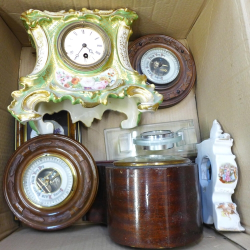 770 - A box of clocks and barometers including two ceramic cased clocks