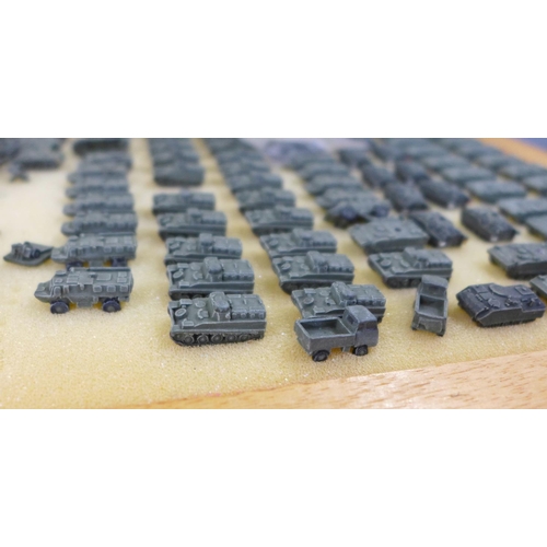 795 - Nine cases with a large collection of 6mm 1/300 scale table top war gaming armoured tanks and other ... 