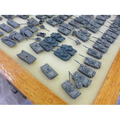 795 - Nine cases with a large collection of 6mm 1/300 scale table top war gaming armoured tanks and other ... 