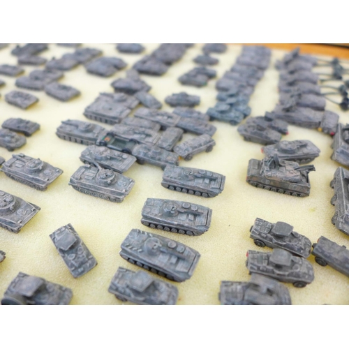 795 - Nine cases with a large collection of 6mm 1/300 scale table top war gaming armoured tanks and other ... 