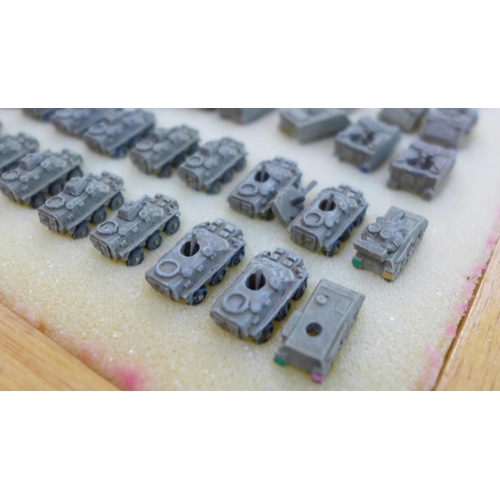 795 - Nine cases with a large collection of 6mm 1/300 scale table top war gaming armoured tanks and other ... 