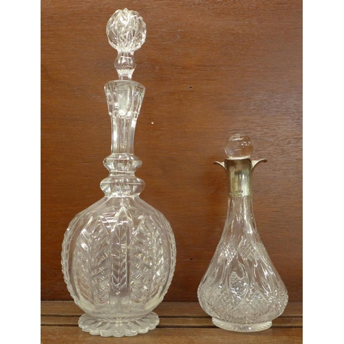 815 - A silver mounted glass decanter and a cut glass decanter, (2)