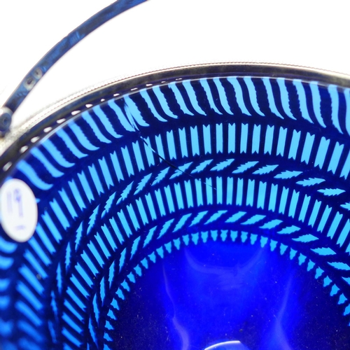 816 - A Victorian pierced silver basket with blue glass liner, London 1894, West & Son, 277g, 144mm