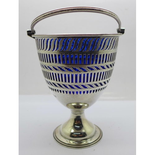 816 - A Victorian pierced silver basket with blue glass liner, London 1894, West & Son, 277g, 144mm