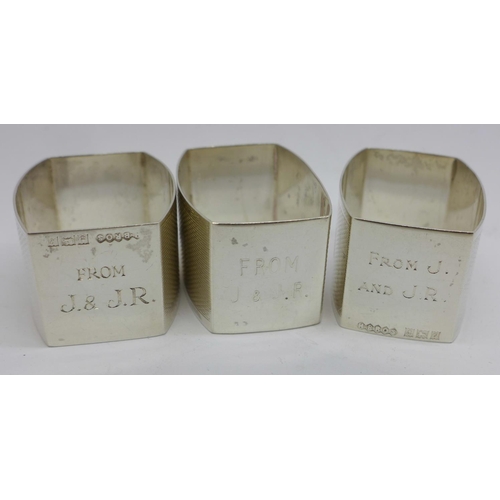 822 - Three silver napkin rings, Harman Bros., Birmigham  1966 and 2 x 1963, 56g, with inscriptions