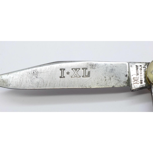 832 - Two I.XL pocket knives, George Wolstenholm, Sheffield, England