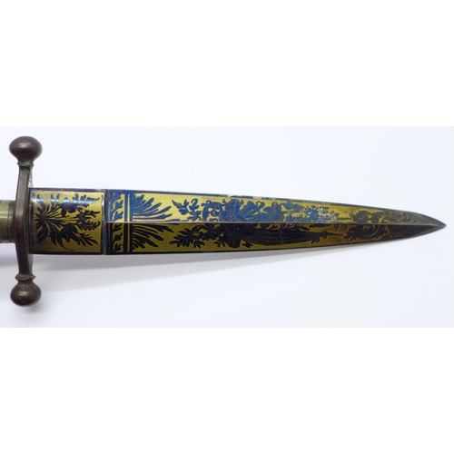 834 - An early 19th Century dagger with decorated steel blue and gilt blade, with scabbard, 23cm