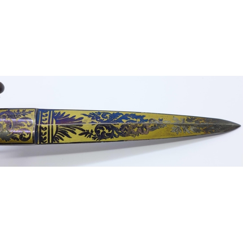 834 - An early 19th Century dagger with decorated steel blue and gilt blade, with scabbard, 23cm