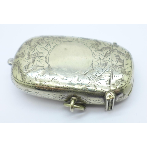 838 - A plated combination vesta case, sovereign holder and stamp holder