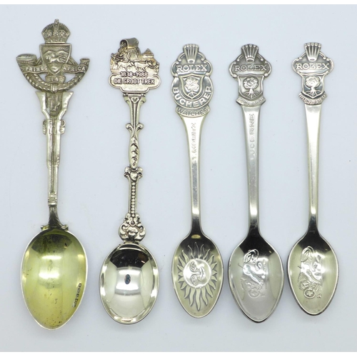 839 - Three Rolex spoons, a silver spoon and one other spoon