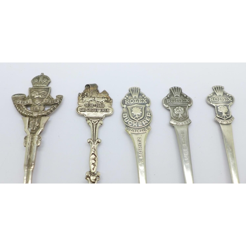 839 - Three Rolex spoons, a silver spoon and one other spoon