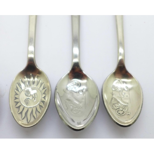 839 - Three Rolex spoons, a silver spoon and one other spoon