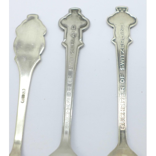 839 - Three Rolex spoons, a silver spoon and one other spoon