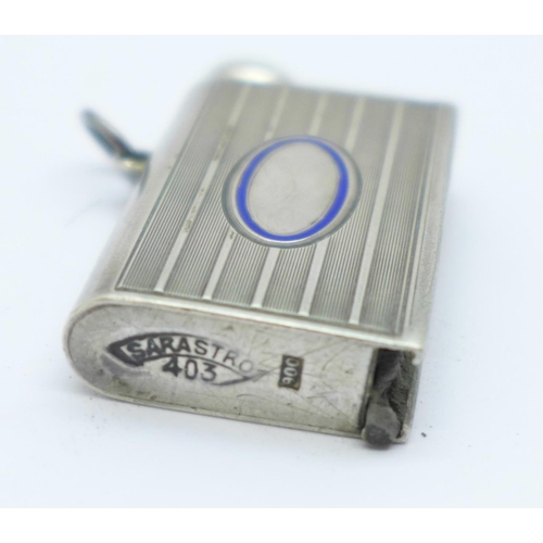 841 - A .900 silver lighter/vesta, with blue enamel oval, marked Sarastro 403