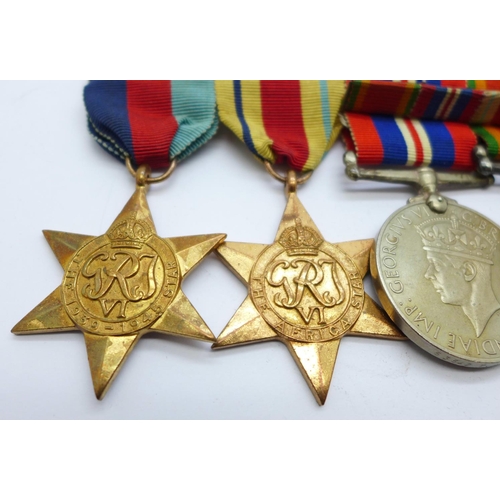 849 - A set of four WWII medals including Africa Service Medal and a Queen Elizabeth II Coronation medal t... 