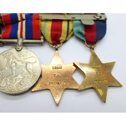 849 - A set of four WWII medals including Africa Service Medal and a Queen Elizabeth II Coronation medal t... 