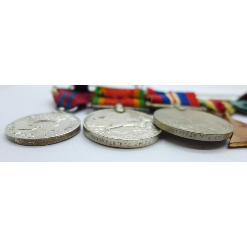 849 - A set of four WWII medals including Africa Service Medal and a Queen Elizabeth II Coronation medal t... 