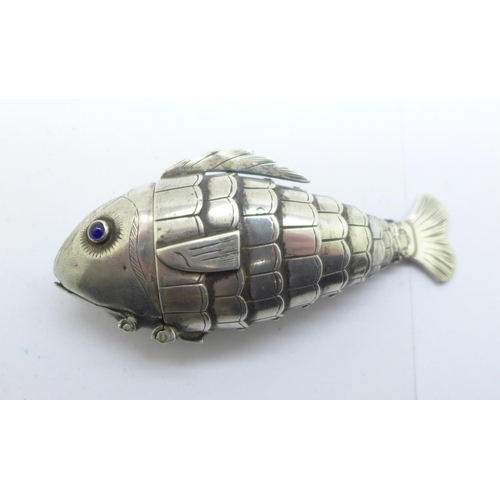 857 - An antique silver articulated fish spice box, with blue cabochon eyes, possibly Georgian, 73mm, mout... 