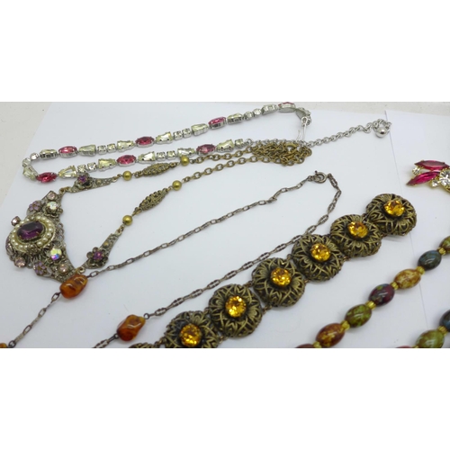 860 - A collection of vintage costume jewellery including filigree, diamante, agate, pearl necklaces, etc.