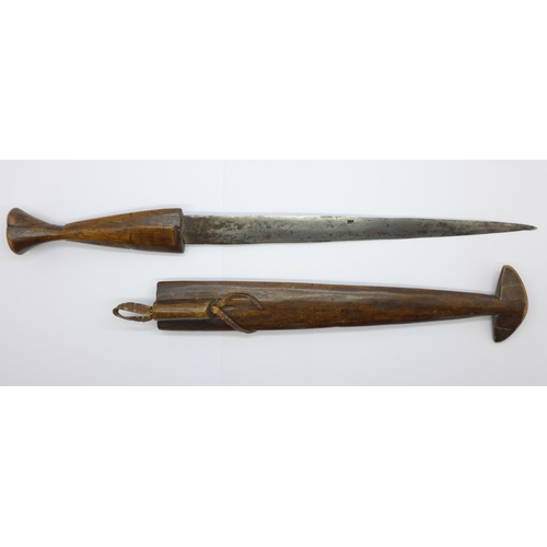 860a - An African dagger with carved wooden handle and scabbard, 39cm with scabbard