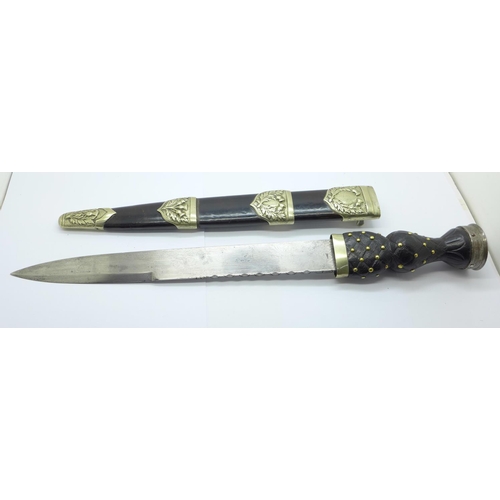 860d - A Scottish dress dagger with scabbard, the blade marked Mole & Sons, Birmingham, the scabbard marked... 