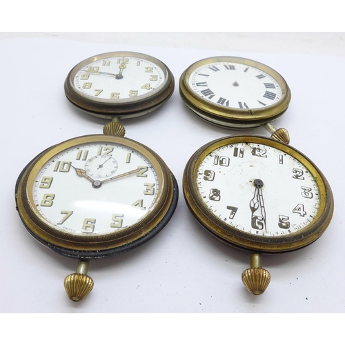 874 - Four travel clocks, a/f, lacking cases