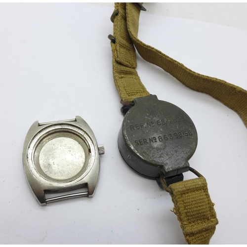 875 - A military compass and a wristwatch case