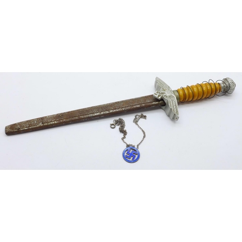 886 - A German letter opener, the blade marked Wolf & Doring, Solingen and DRGM, a/f, and an enamelled cha... 