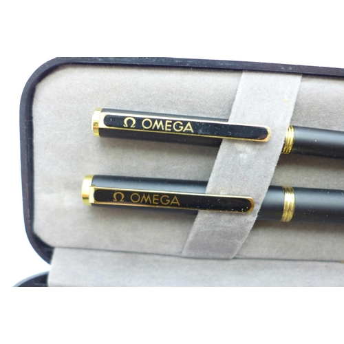 900 - A fountain pan and a ballpoint pen, both marked Omega