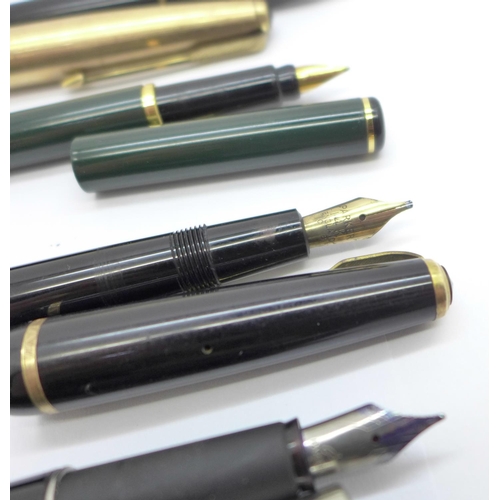 903 - Four Parker fountain pens including 65 and Junior with 14ct gold nibs