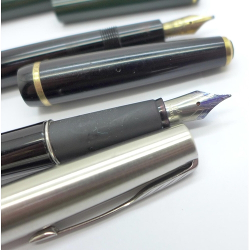 903 - Four Parker fountain pens including 65 and Junior with 14ct gold nibs