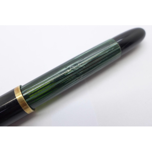 905 - A Pelikan fountain pen with 14ct gold nib and an élysée fountain pen