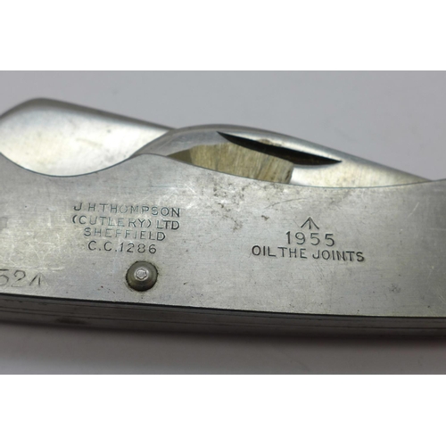 929 - A military pocket knife, Thompson, Sheffield, marked 1955 and with broad arrow