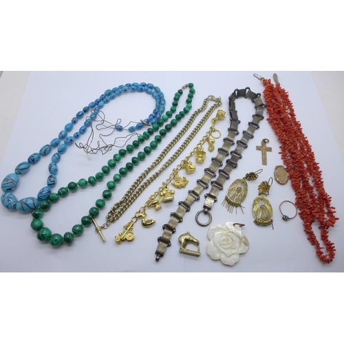 933 - A collection of jewellery including a white metal collar, no fastener, malachite beads, a charm brac... 