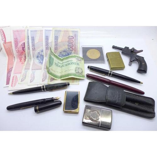 934 - Pens, lighters, banknotes, etc.