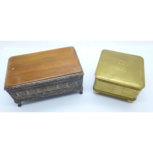 935 - A white metal box with olive wood top and a gilt metal velvet lined box with crest of arms on the li... 