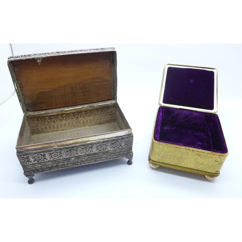 935 - A white metal box with olive wood top and a gilt metal velvet lined box with crest of arms on the li... 