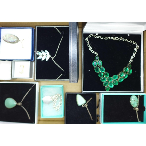 943 - A collection of silver stone set jewellery, boxed