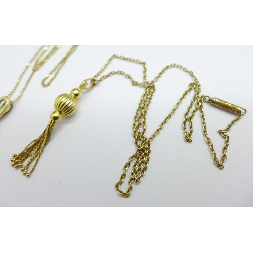 962 - A 9ct gold tassel pendant on a chain and a yellow metal pendant on a 9ct gold chain, (tassel pendant... 