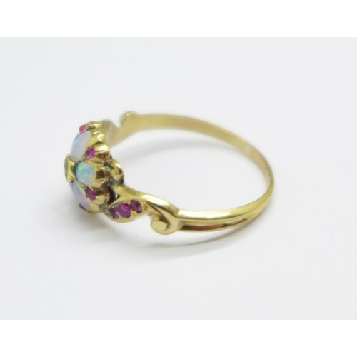 966 - A Victorian yellow metal, diamond, opal and ruby cluster ring, 1.6g, L, (tests as high carat gold)